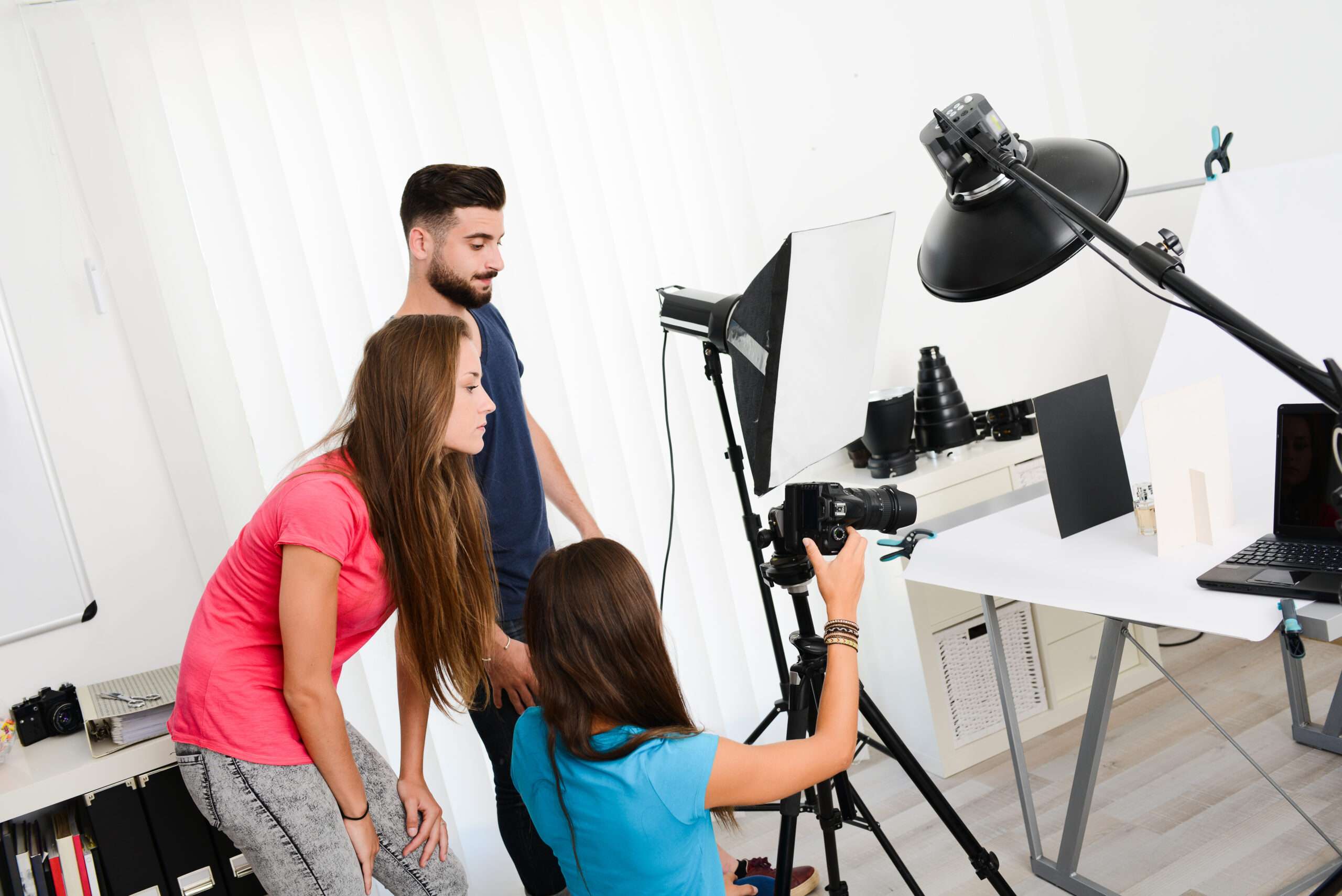 group of young photographer student on photography shooting workshop course indoor in a photo studio